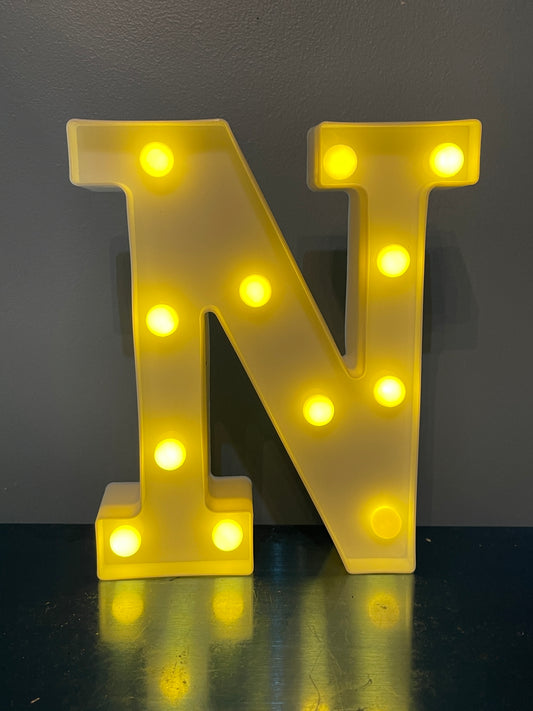 White Letter “N” lighted