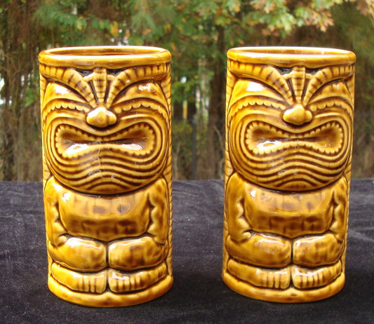 PAIR OF 2 GERMAINE’S LUAU HAWAII WARRIOR TIKI CERAMIC GLASSES