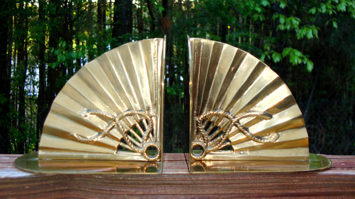 [SOLD] Mid-Century Hollywood Regency Brass Bookends