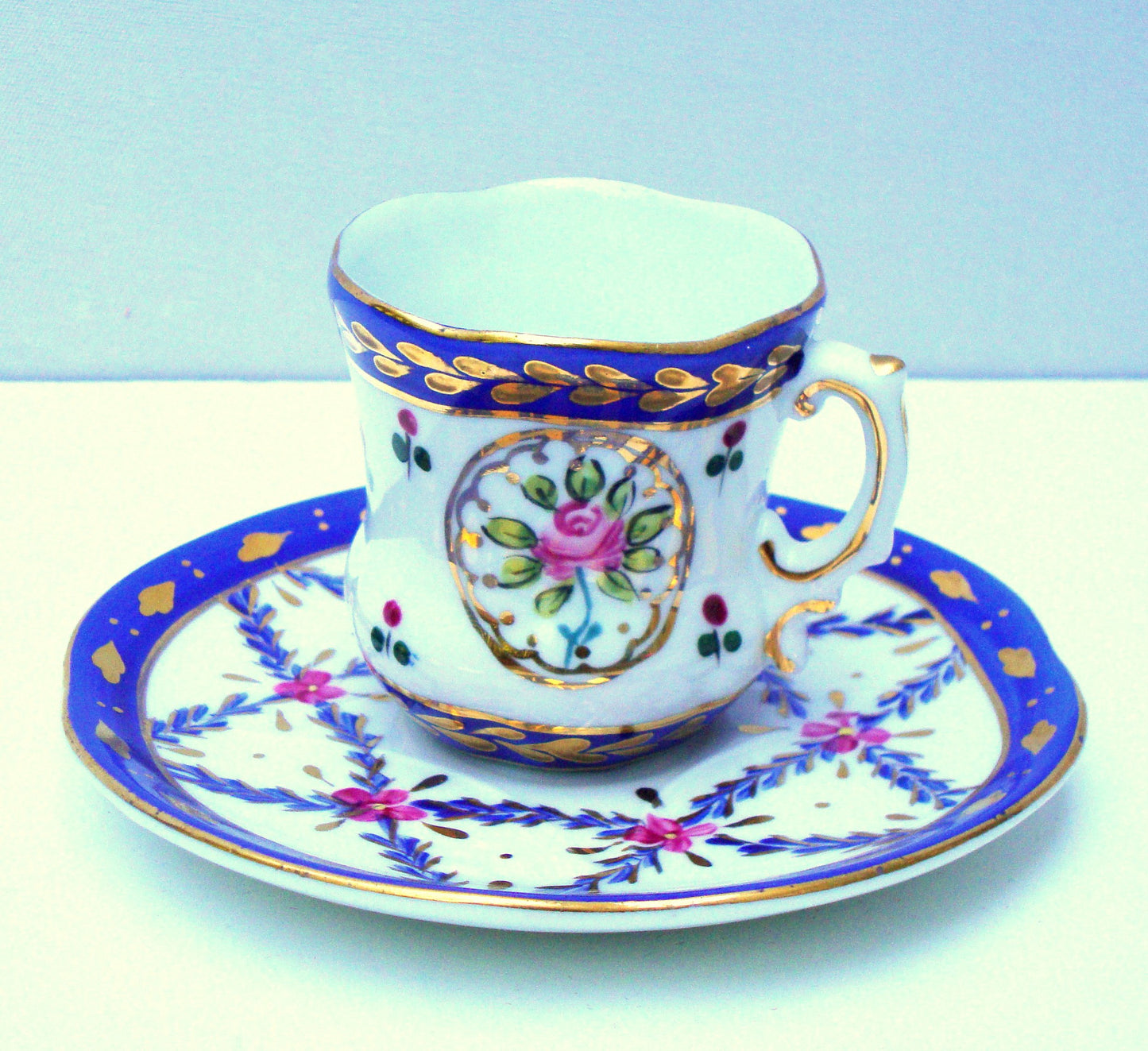 Limoges Gilt Blue Pink Porcelain Tea Cup & Saucer