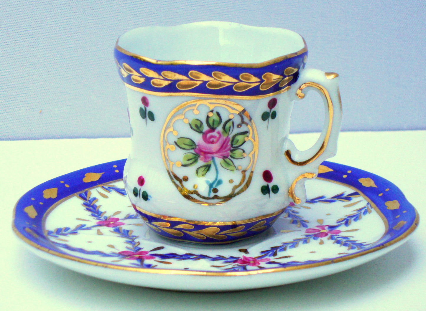 Limoges Gilt Blue Pink Porcelain Tea Cup & Saucer