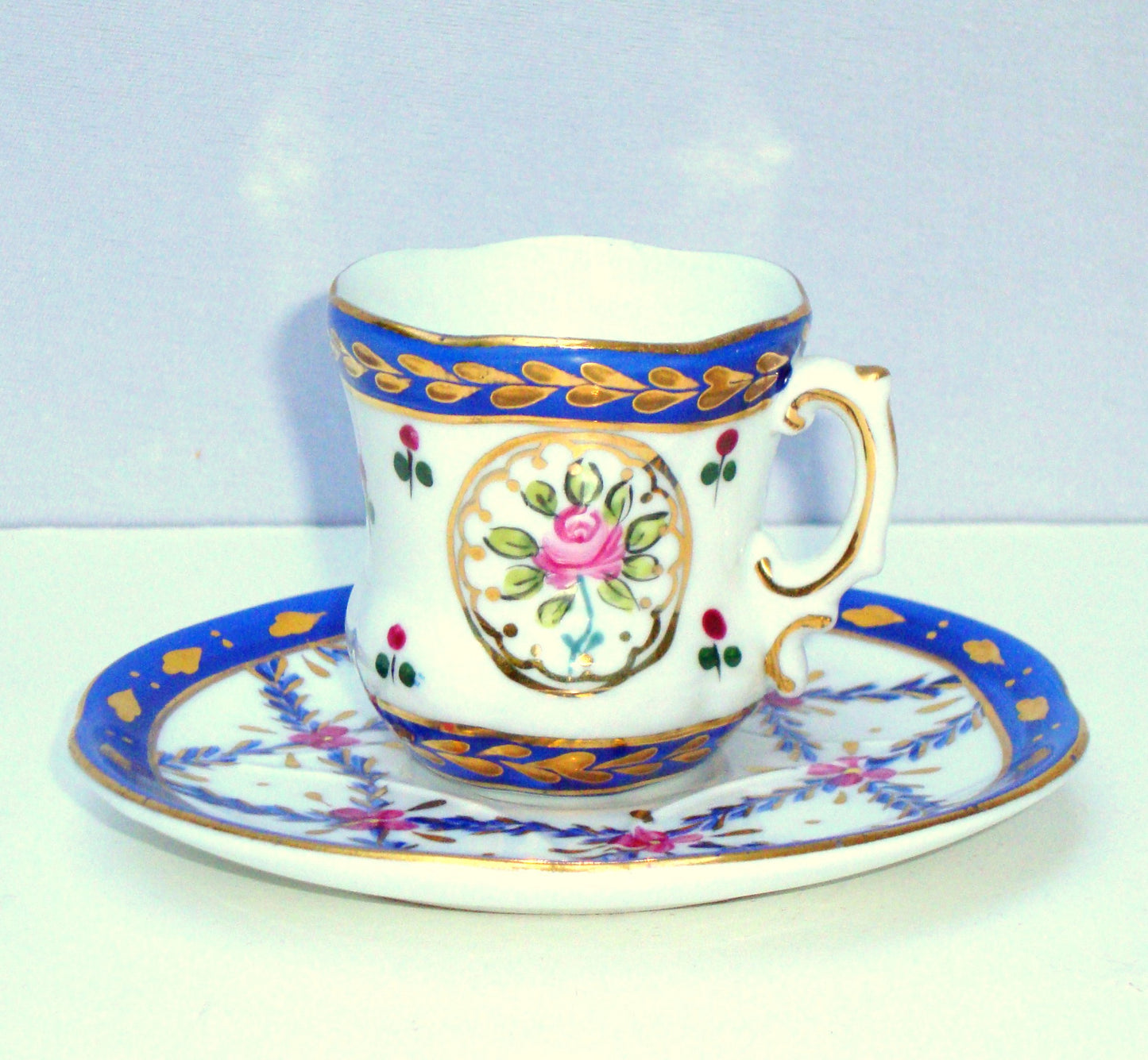 Limoges Gilt Blue Pink Porcelain Tea Cup & Saucer