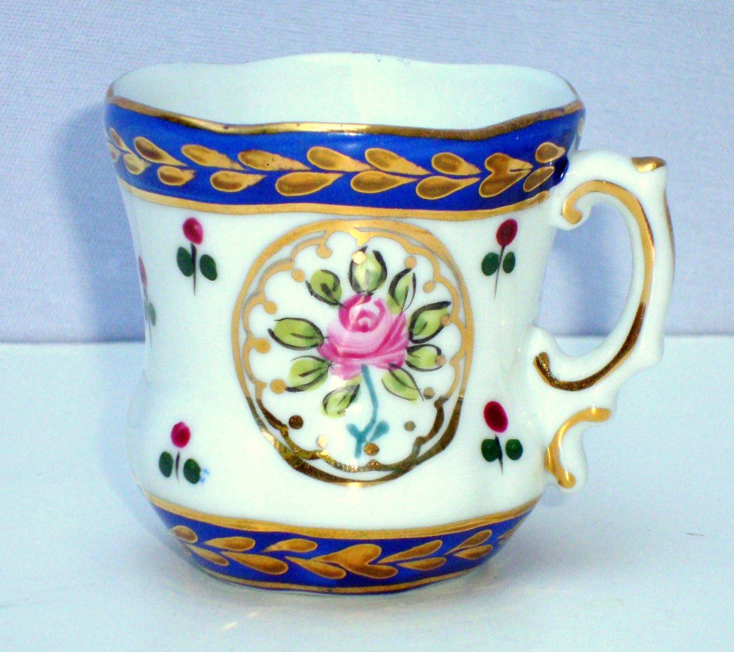 Limoges Gilt Blue Pink Porcelain Tea Cup & Saucer