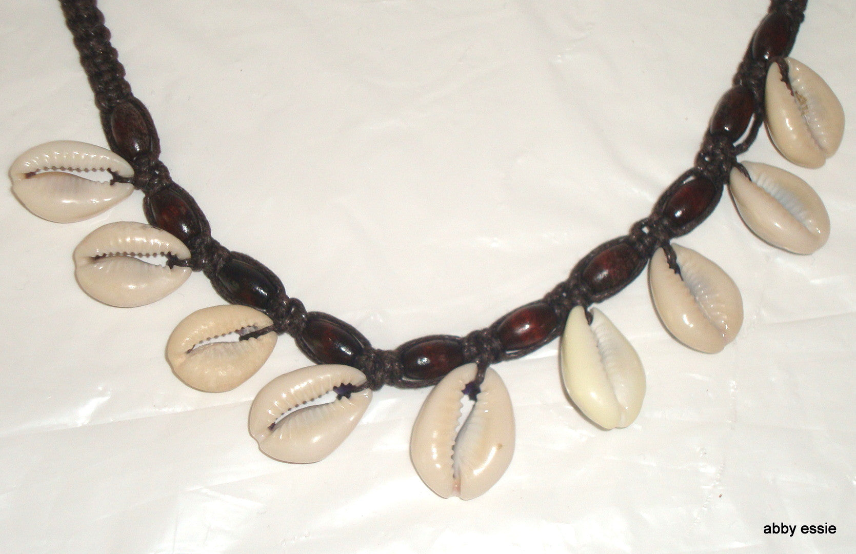 COWRY SHELL & BLACK LEATHER BRAIDED CHOKER Abby Essie
